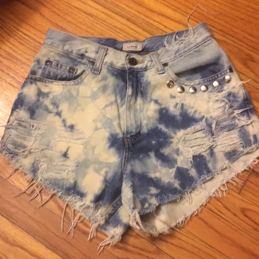 Custom distressed and studded denim shorts